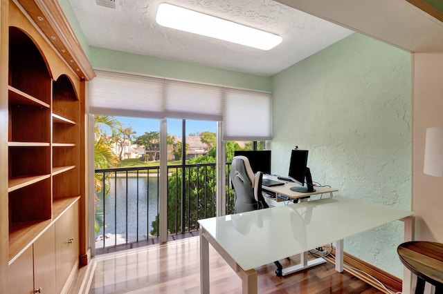 office with a textured ceiling