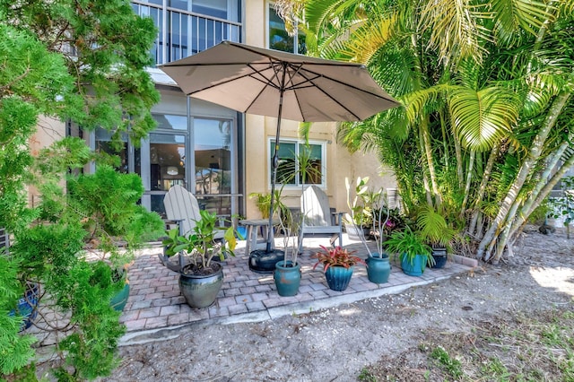 view of patio with a balcony