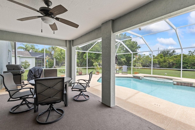 view of pool featuring ceiling fan, a lanai, grilling area, a patio area, and an in ground hot tub