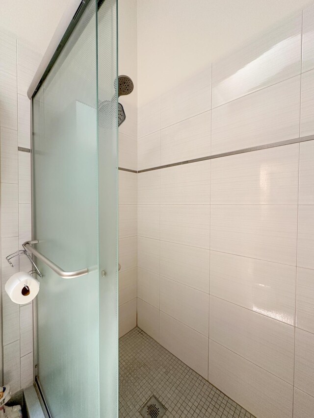 bathroom with an enclosed shower