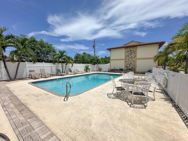 view of pool with a patio