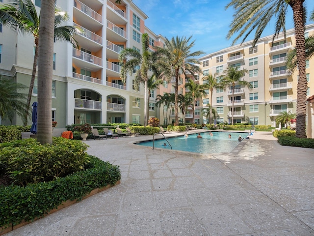 view of swimming pool featuring a patio area