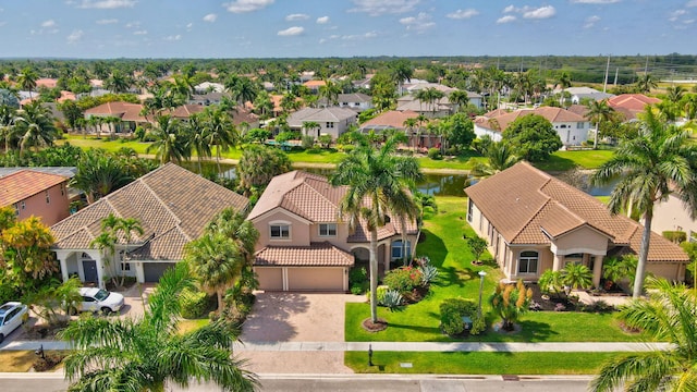 bird's eye view with a water view