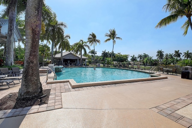 view of swimming pool featuring a patio