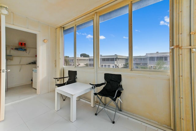 sitting room featuring light tile patterned floors