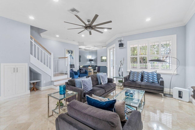 living room with ceiling fan and crown molding