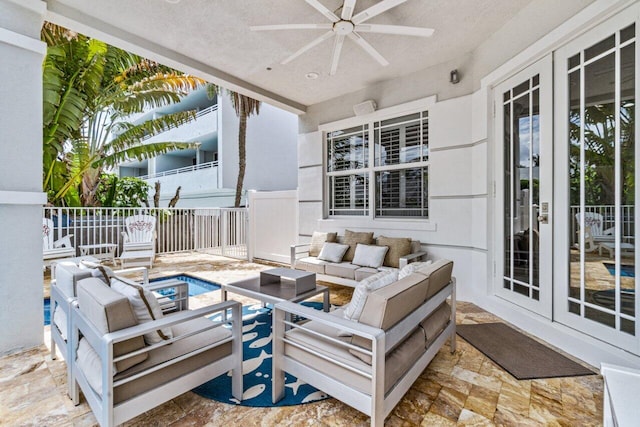 view of patio / terrace with ceiling fan, an outdoor hangout area, and french doors