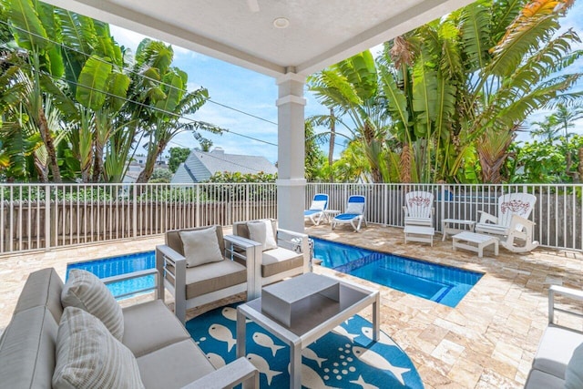 view of pool featuring outdoor lounge area and a patio