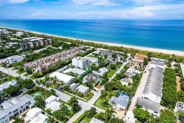 aerial view with a beach view and a water view