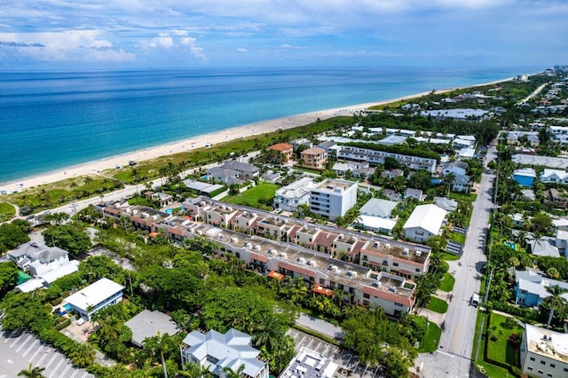 bird's eye view featuring a water view and a view of the beach