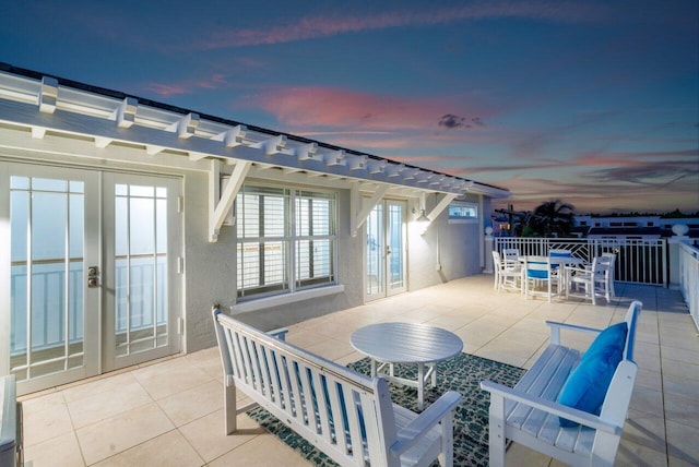 patio terrace at dusk with french doors