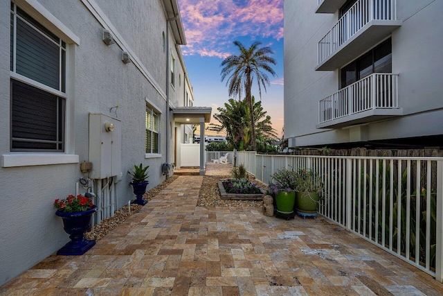 view of patio terrace at dusk