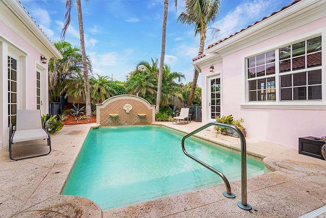 view of pool with a patio