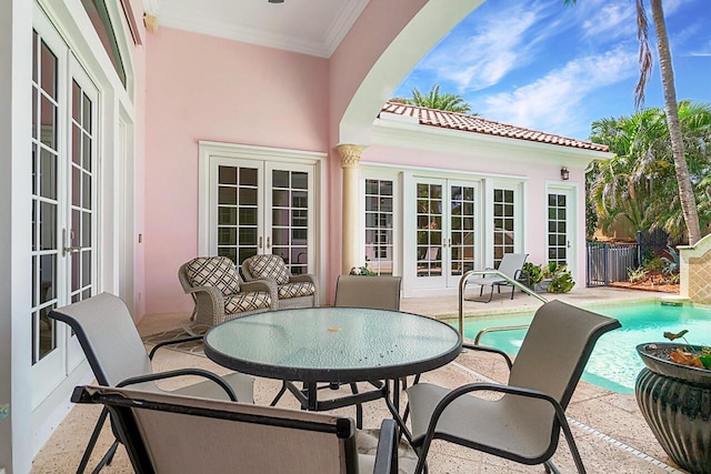 view of patio featuring french doors