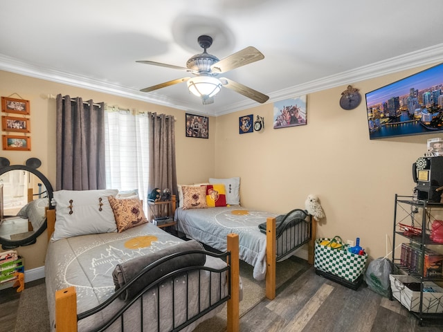 bedroom featuring dark hardwood / wood-style flooring, ceiling fan, and crown molding