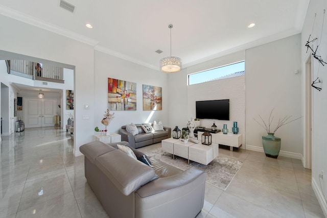 living room with ornamental molding