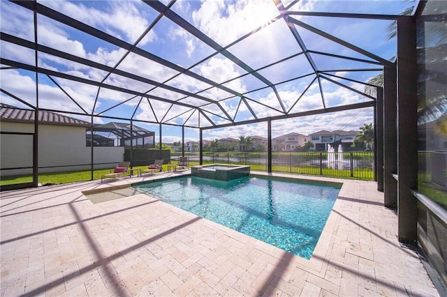 view of pool featuring a lanai, an in ground hot tub, and a patio