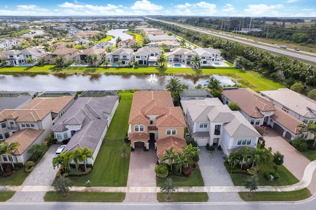 drone / aerial view with a water view