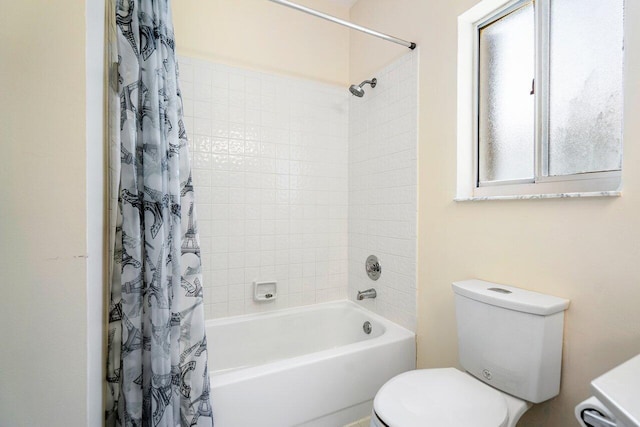 bathroom with toilet and shower / tub combo with curtain