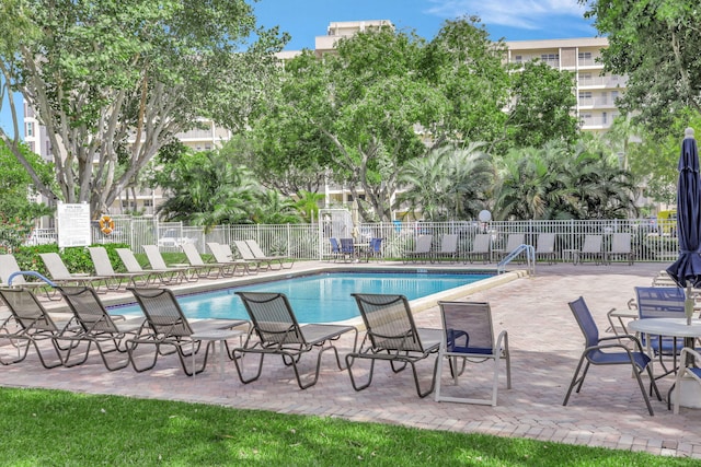 view of pool featuring a patio