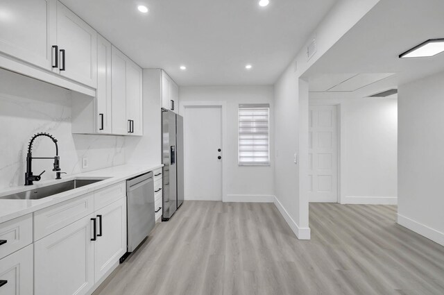 kitchen with white cabinetry, island range hood, range with electric cooktop, and kitchen peninsula