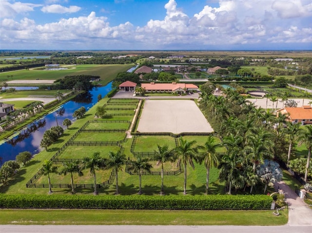 aerial view featuring a rural view and a water view