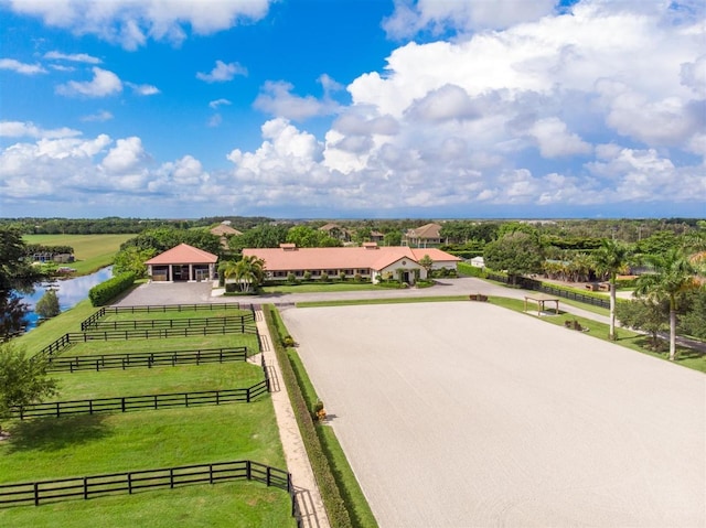 aerial view with a rural view and a water view