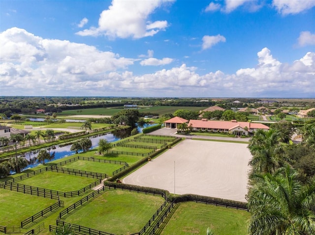 bird's eye view featuring a water view and a rural view