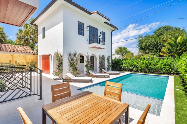 view of pool featuring a patio