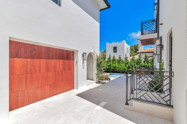 view of side of property featuring a patio