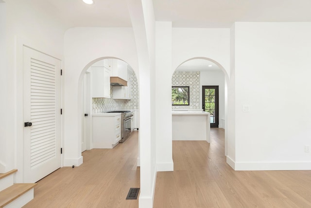 hallway featuring light wood-type flooring