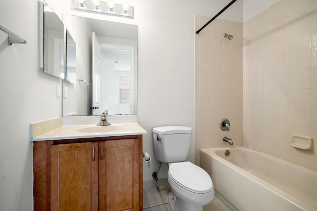 full bathroom with tile patterned floors, vanity, toilet, and tiled shower / bath