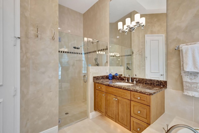 bathroom featuring vanity, tile patterned floors, and a shower with door