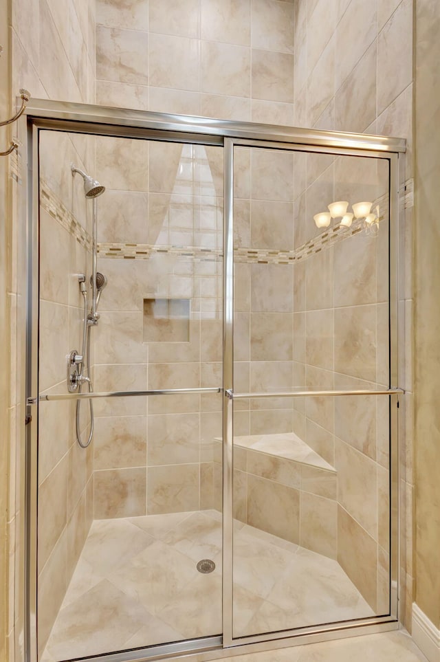 bathroom featuring an enclosed shower