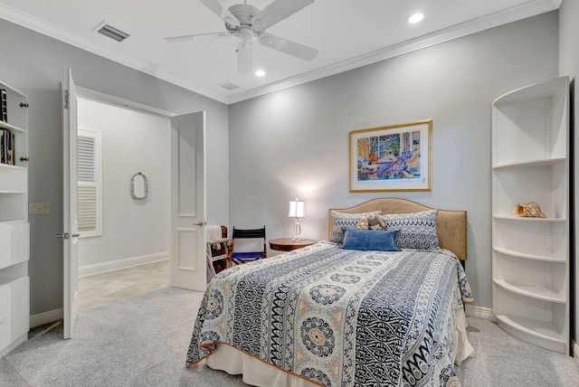 carpeted bedroom featuring ceiling fan and crown molding