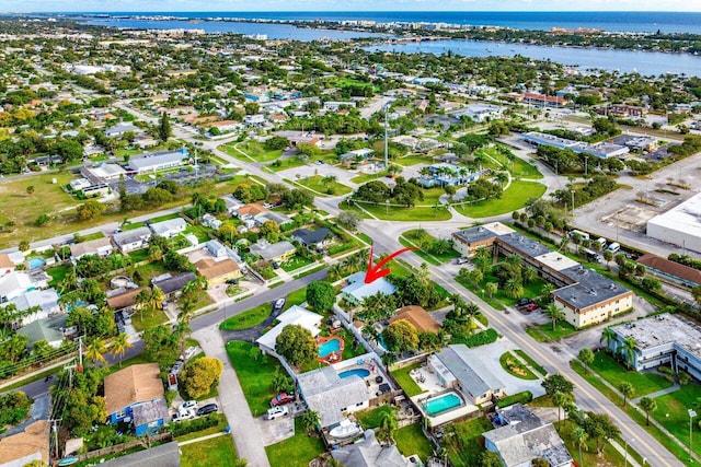 bird's eye view with a water view