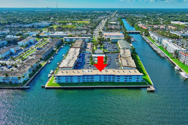 birds eye view of property featuring a water view