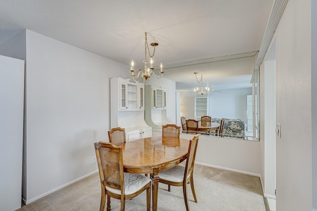 carpeted dining space with an inviting chandelier