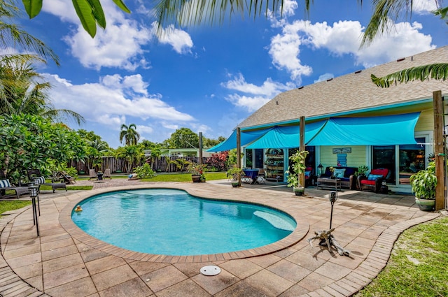 view of swimming pool featuring a patio and an outdoor hangout area