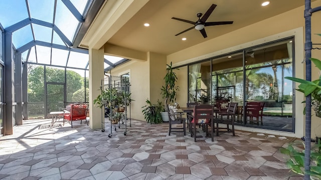 view of patio / terrace with glass enclosure and ceiling fan