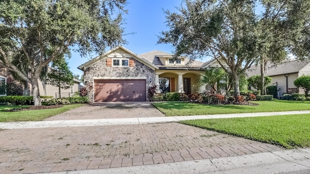 craftsman-style home featuring a front yard