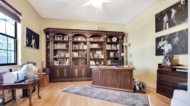 office area with ceiling fan and light hardwood / wood-style flooring