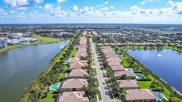 bird's eye view with a water view