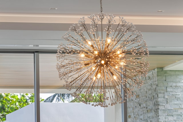 interior details with a chandelier