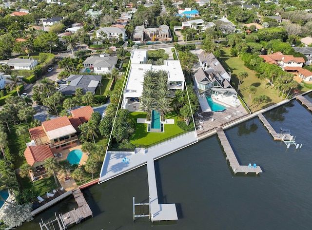 birds eye view of property featuring a water view