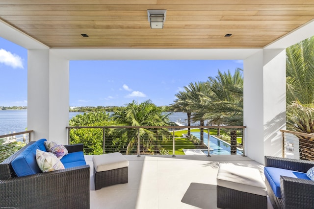 view of patio featuring a water view