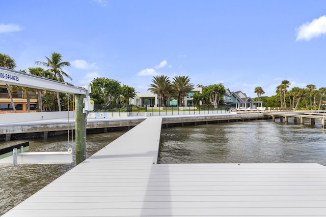 dock area featuring a water view