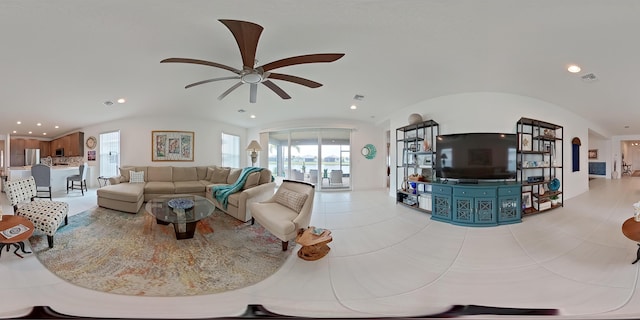 living room with lofted ceiling and ceiling fan