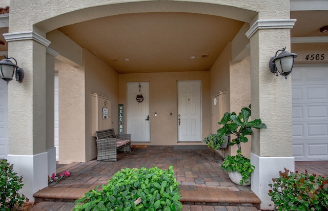 property entrance with a garage