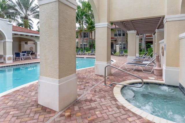 view of pool featuring a pergola and a patio area